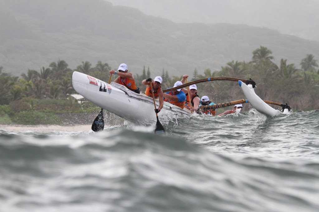 OC6 crew paddles in Cook Islands